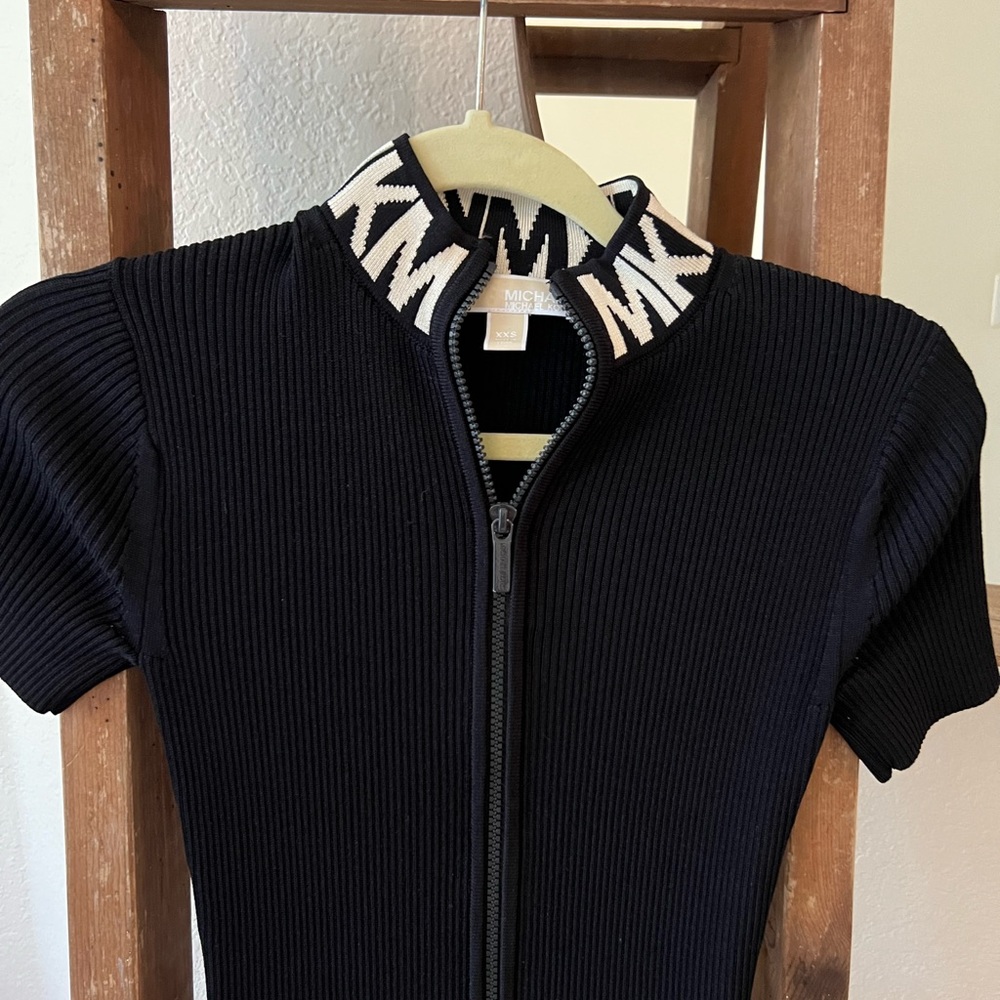 Michael Kors dress size Xxs but fit up to M,  L size.